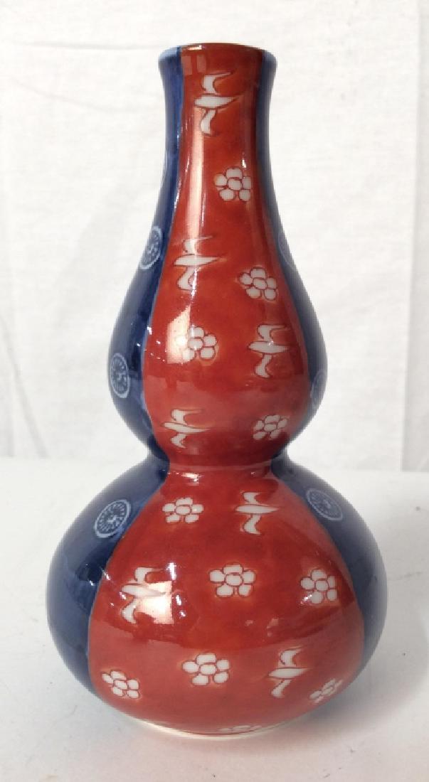 Porcelain Color Block Vase, Asian: Porcelain color block Vase, Asian Signed illegibly on underside, red and blue toned design over white toned porcelain, floral and flying bird design, Bud Vase, Asian tableware, Asian arts and crafts d