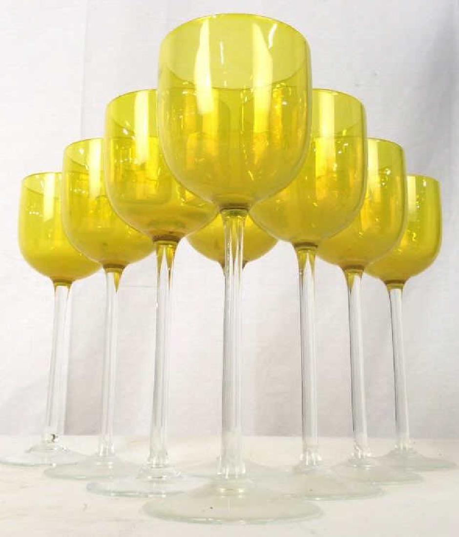 Lot 8 Yellow Toned Wine Class: Stemware has yellow toned basin. Each measures approx 9.5 inches tall 3.25 inches wide. 1 glass has imperfection on rim. Stemware, wine glasses, beverage glasses. 6