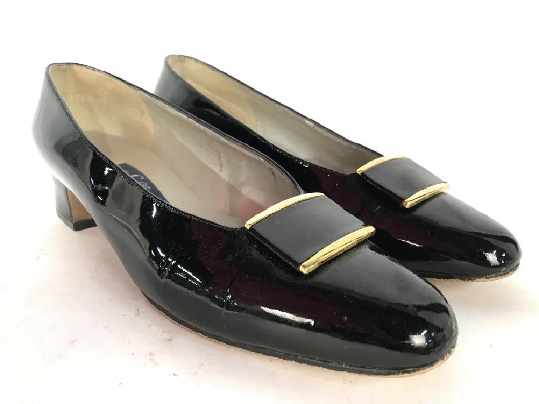 SELBY Women’s Leather Heels: Soles of shoes read SELBY. Shoes have 1.5 inch tall heels. Helps are black toned with black & gold toned shoe ornament. Underside reads leather. Size 9. Fashion accessory, women's fashion, wearable, e