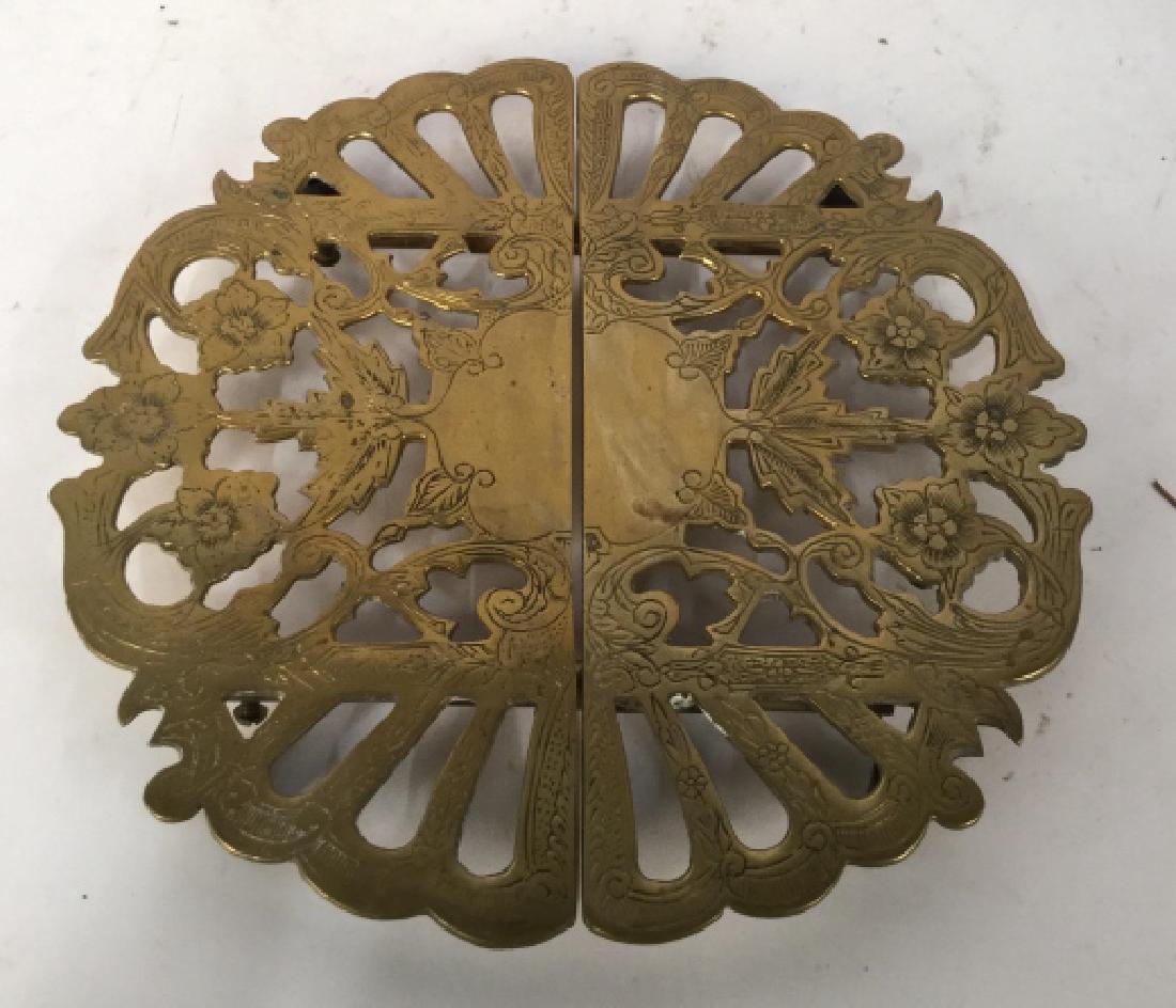 MOTTEHADEH Expandable Brass Footed Trivet: Labeled underside for Mottehedah , Luxury Tableware, Etched design closed measures app 8.5 inch diameter, expands to 11 inches, tableware
