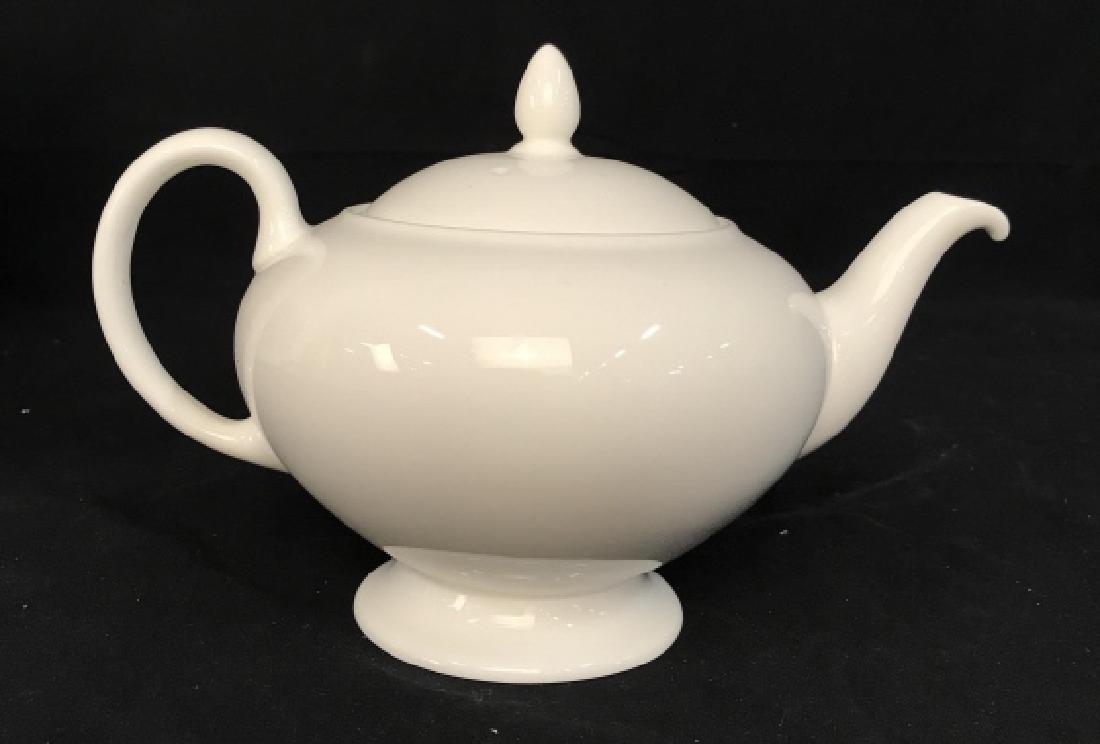 Wedgwood Bone China Tea Pot, England: Footed pedestal standing tea pot, table ware, English Bone China, measures ht app 7 inches, handle to spout app 9.5 inches, marked for Wedgwood Underside