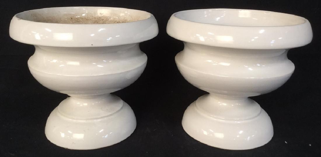 Pair White Toned Ceramic Planter Urns: Pair White Toned Ceramic Planter Urns. Some surface wear and imperfections to glaze. Garden accessory, indoor outdoor, doorway decor, home accent, measures app 9 in By 10 in. 4