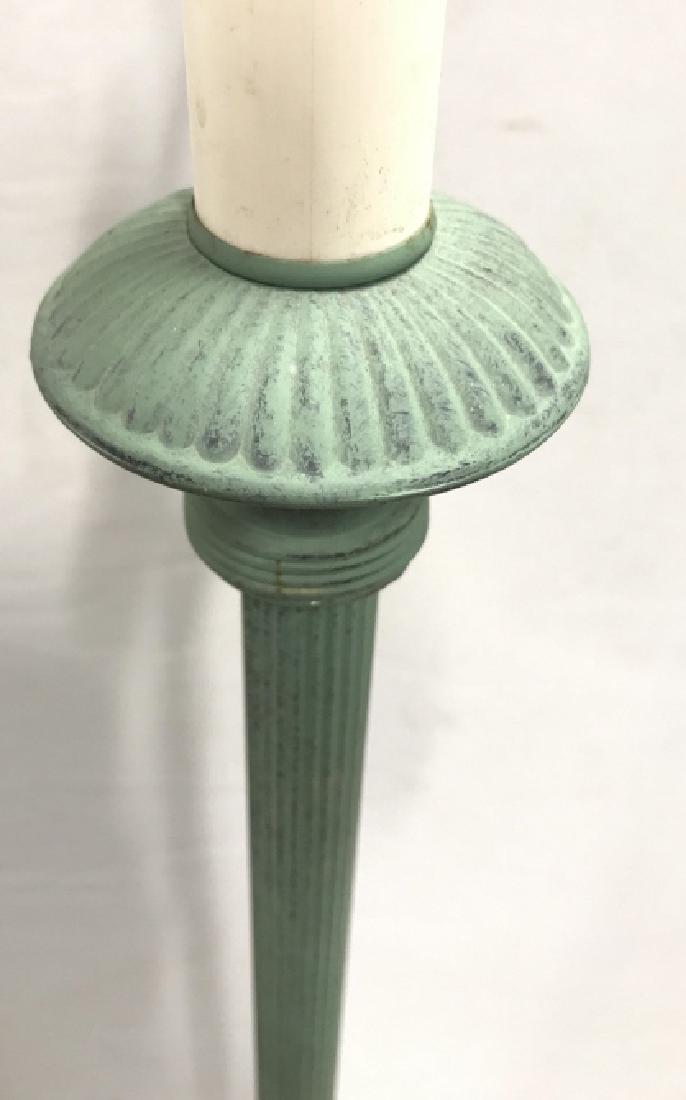 Green Toned Patina Metal Floor Lamp: Floor lamp is green toned and metal. Piece has circular base lamp includes green toned metal finial. Measures approx 62 inches tall 10 inches wide at base. floor lamp, home lighting, home decor, home 