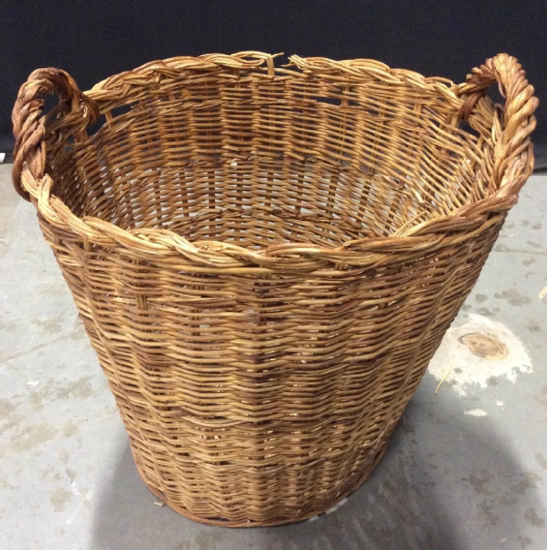 Vintage Tall Woven Basket: Vintage tall woven / wicker basket with two handles. Measures approx 17.5 inches in height by 18 inches in diameter. Some surface wear / damage consistent with age and use. Interior home decor, rustic