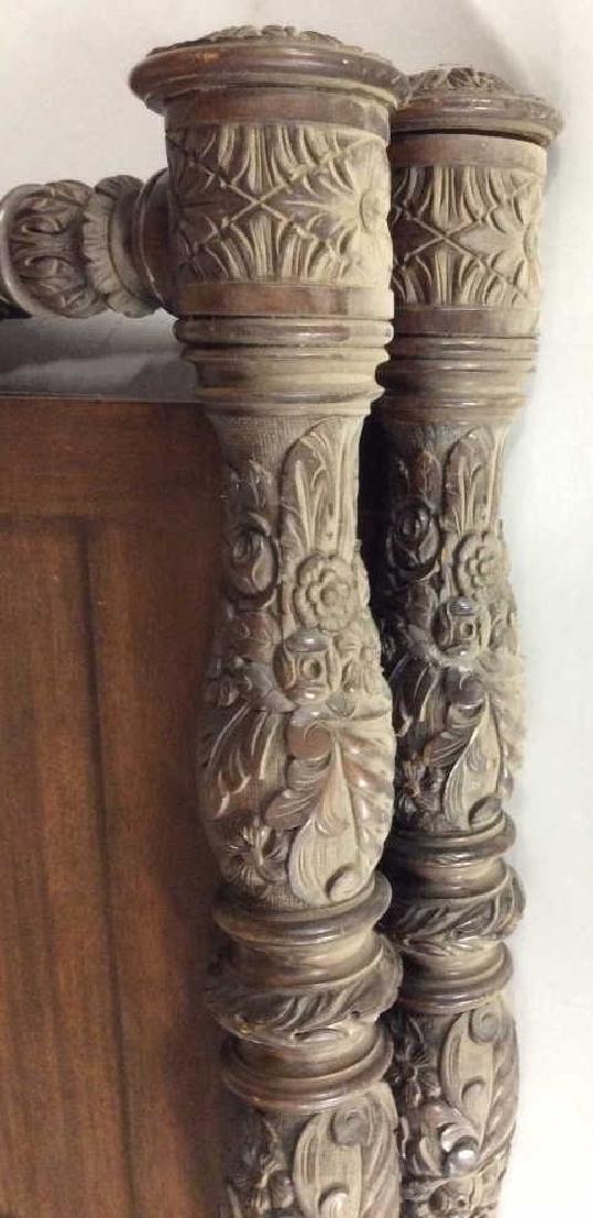 Antique Carved Wood Bed: Antique Carved Wood Bed. With ornately carved floral design. Some surface wear appropriate to age. Measures approx 36 in by 34, lot includes head board and foot board. Twin sized / kids bed. Home furn