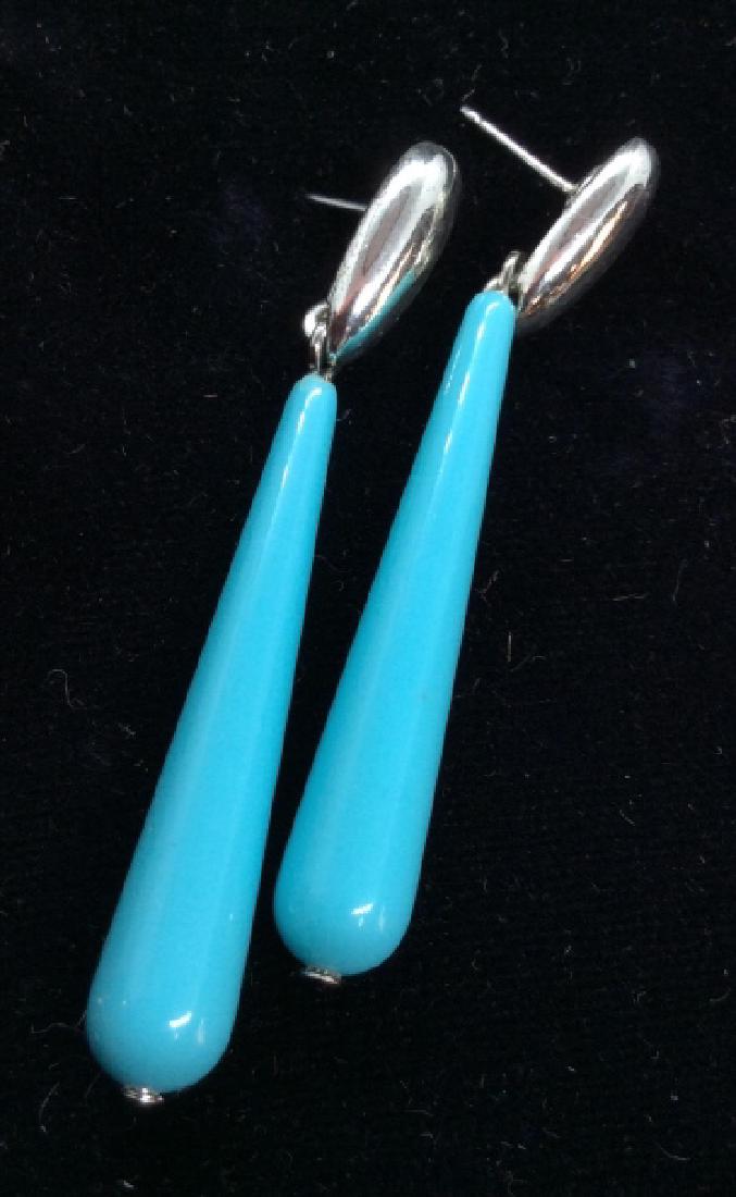 MONET Elongated Teardrop Form Earrings: Silver Toned Metal with blue toned composite material hanging Charm, appear to be marked MONET on earring. measures approx 2 in, women’s fashion accessories, women’s costume estate jewelry, wearab