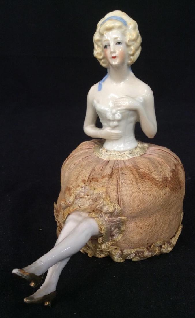 Antique Porcelain Pin Cushion Doll: Antique porcelain female sitter Figural, with skirt of fabric as pin cushion, collectible, desk accessory, sewing collectible, ht app 5.5 inches