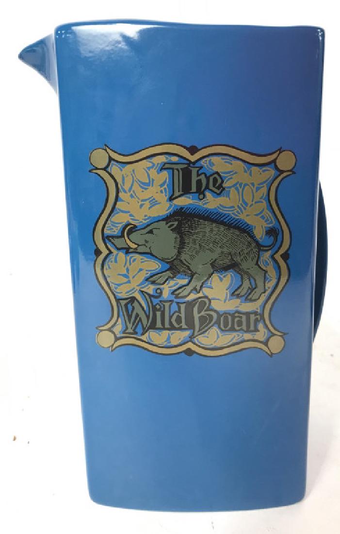 Carltonware Painted Porcelain Pitcher: Underside reads CARLTONWARE MADE IN ENGLAND. Piece is blue toned with detail that reads THE WILD BOAR. Measures approx 7 inches tall 4.5 inches wide with spout and handle. Pitcher, tableware, vessel, 
