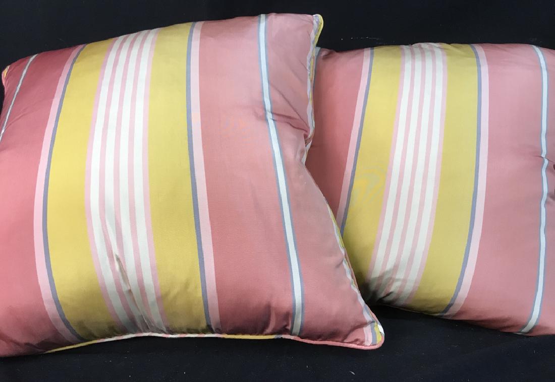 Pair Vibrant Pink & Yellow Satin Throw Pillows: Silk Manuel Canovas fabric, from the D&D Building NYC custom made. Pair of vibrant pink and yellow fabric throw pillows, cushions. Some minor imperfections in fabric seams, might need minor repair. Ea