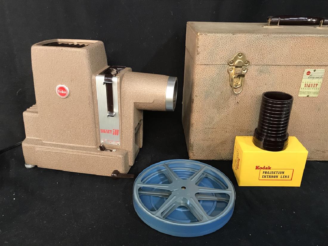 Vintage Kodak Signet 500 Kodaslide Projector: Vintage Kodak Signet 500 Kodaslide Projector with carry case and Ektanon Lense, not tested, marks to exterior of case, projector measures approximately 12 inches long x 10 inches high x 6 inches wide.