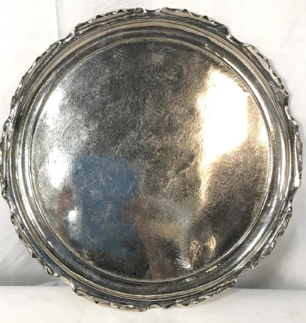 TOWNSHEND & CO Silver Toned Metal Platter: Platter, centerpiece, tableware, Underside of piece reads TOWNSHEND & CO. Piece is silver toned and metal. Edges of piece have Furled in structures. Measures approx 20 inches wide. 6.