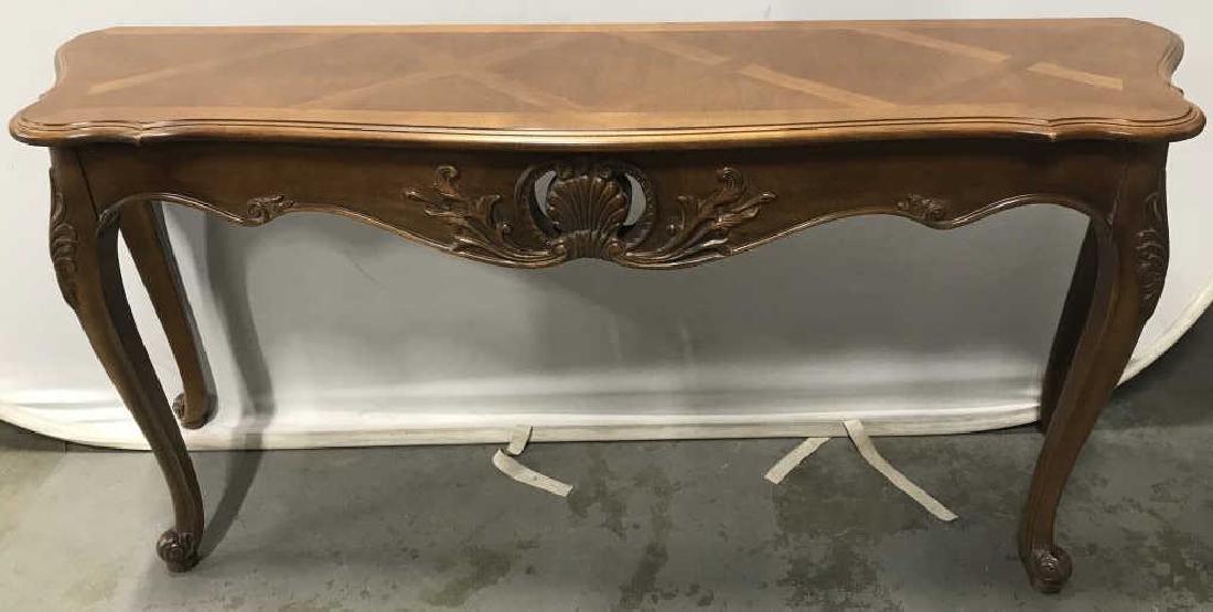 ETHAN ALLEN Console Table W Cabriole Legs: Backside reads ETHAN ALLEN. Console Table is wooden contains intricately carved wooden detail with cabriole style legs. Carved wooden table, wooden console table, carved wooden console table, sofa tab