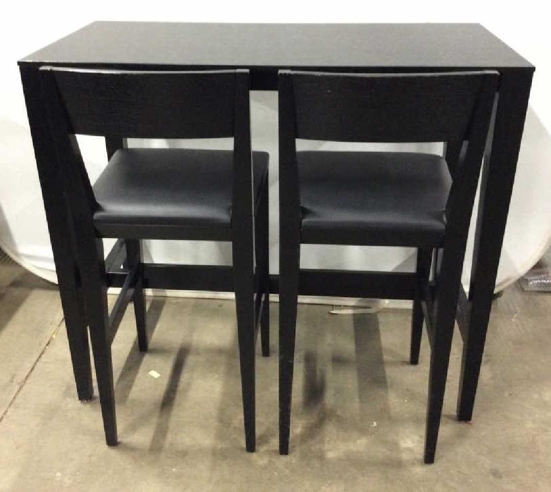 Three Piece Counter Set: Black toned painted wooden table set, two stools with leather style / vinyl style upholstery, and counter height breakfast / kitchen table. Breakfast nook, kitchen / dining room furniture, home furnis