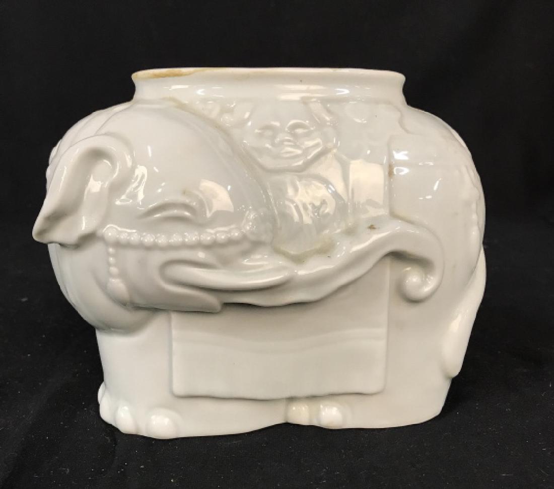 Asian Celadon Porcelain Elephant Vessel: Celadon Porcelain, Asian Ceramics, Pottery, Vase, Vessel, cache pot, Asian decorative arts measures ht 5.5 inches length 7 inches depth app 5 inches