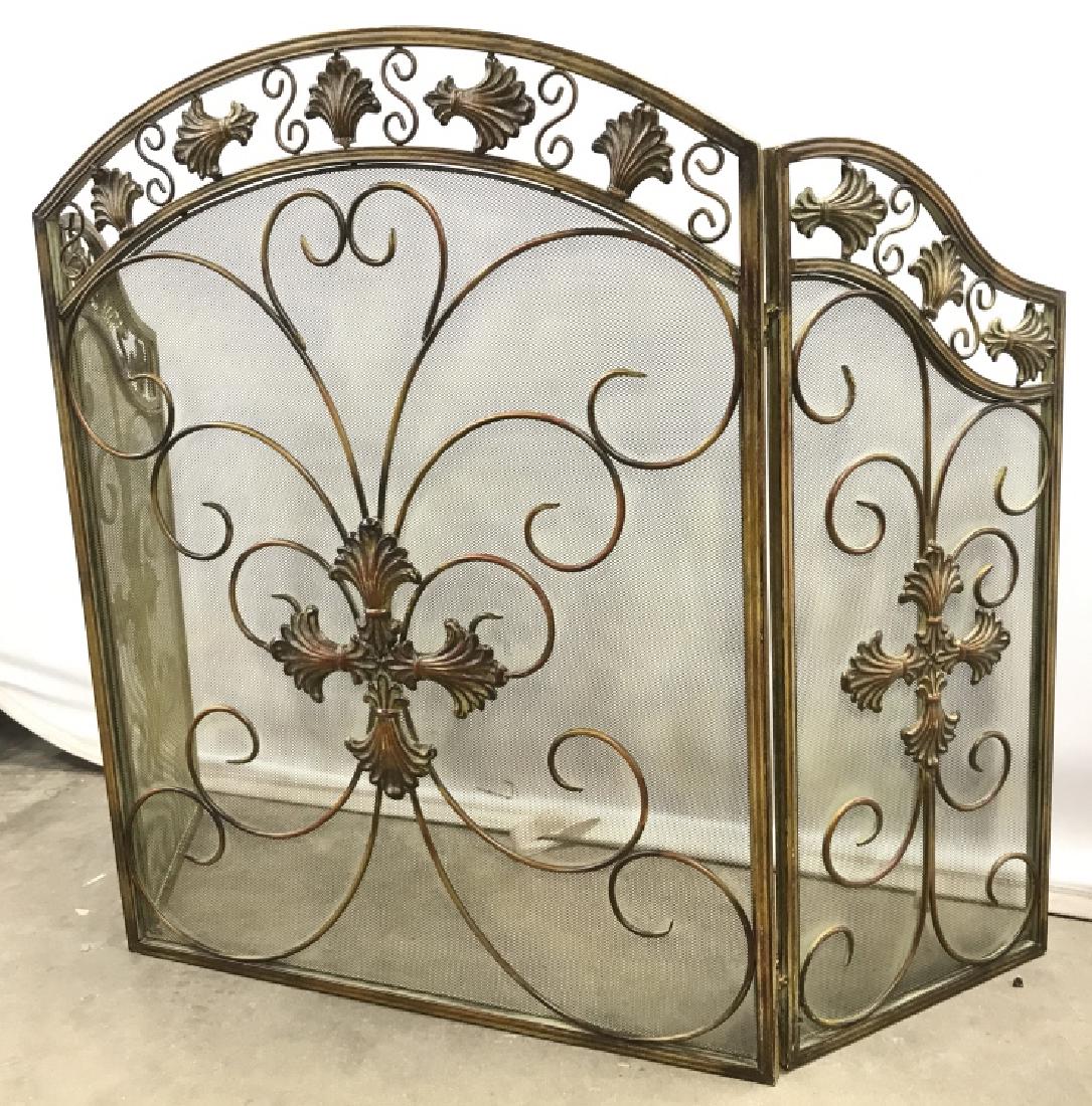 Gold Toned Metal Fireplace Screen: Gold Toned Metal Fireplace Screen. Contains c curve and ornate shape detail. Piece folds in 2 areas. Measures approx 49 inches long, 32 inches tall. FIreplace screen, home accent, rustic home accessor