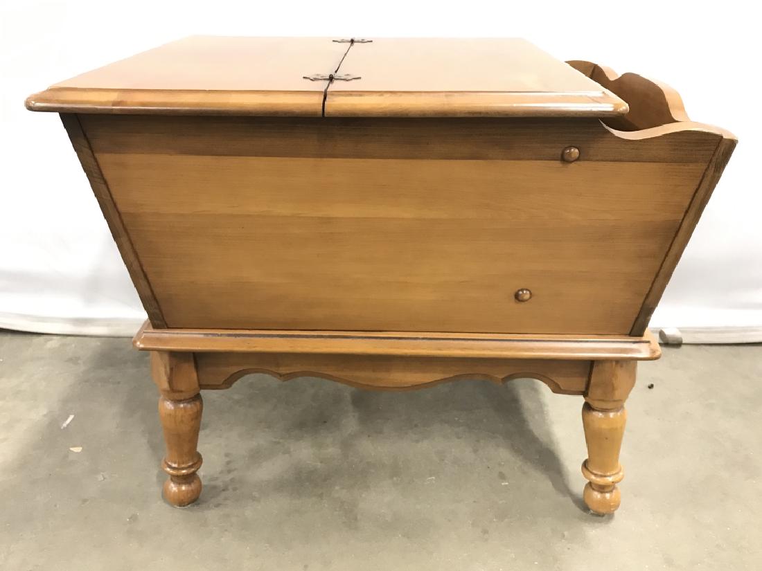 Carved Wooden Dough Box Table: Underside of piece reads doughbox. Contains carved wooden legs and 1 flip open leaf on top. Measures approx 26 inches long 29 inches deep 22 inches tall. End table, side table, home furnishings, ameri