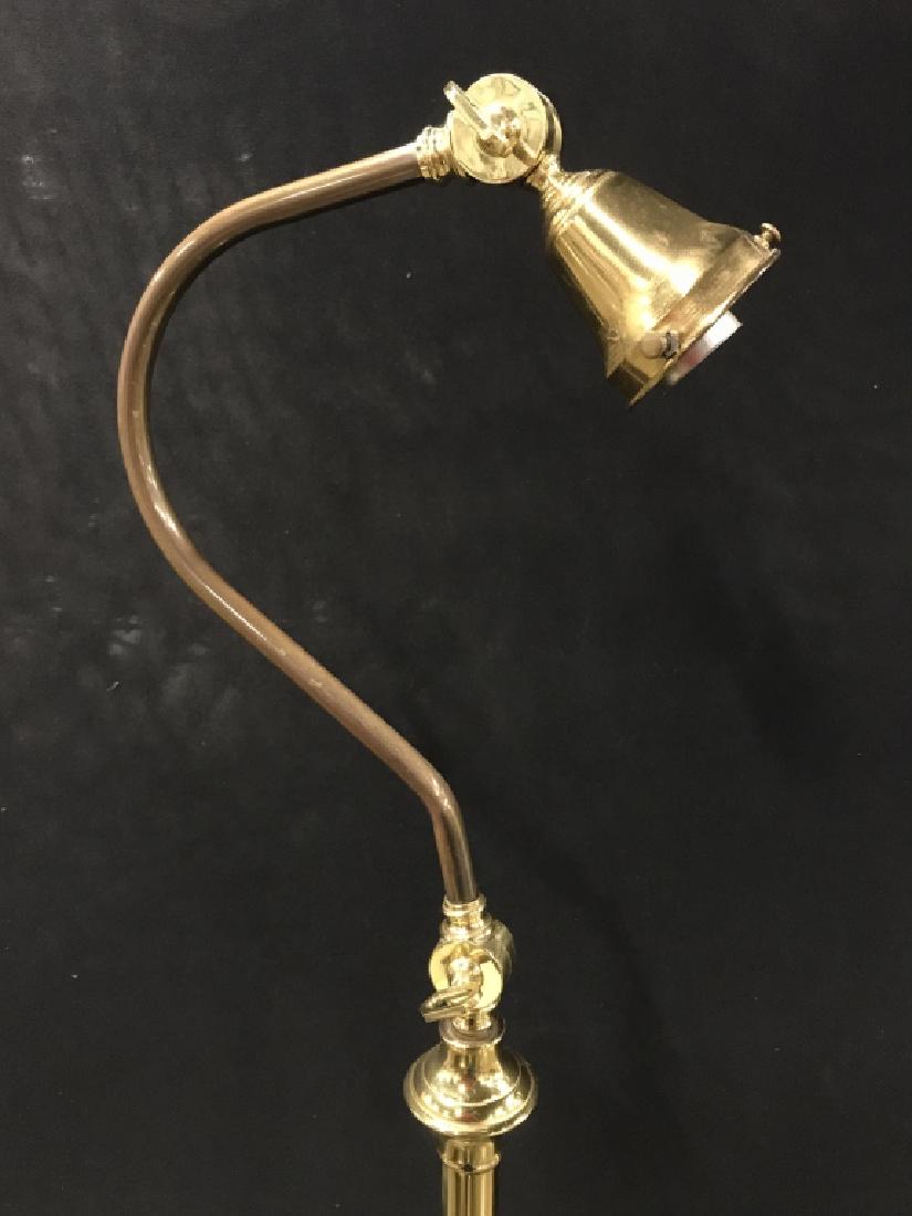 Gold Toned Brass Floor Lamp: Lamp is gold toned & brass. Top of lamp has hook shape. Base is circular. Measures approx 62 inches tall 10 inches wide at base. Home lighting, home accessory, home decoration, home accent 6