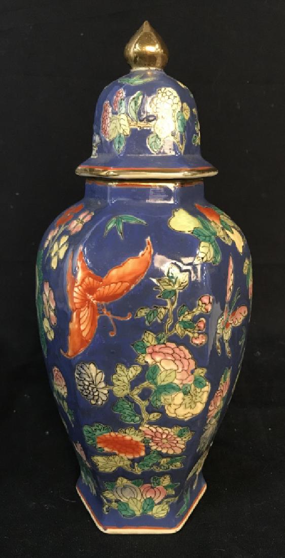 Painted Ceramic Asian Ginger Jar Vessel: Painted Ceramic Asian Ginger Jar Vessel With floral and butterfly motif and gold toned painted top, oriental writing on underside, measures approximately 12.5 inches tall x 5 inches in diameter, no co