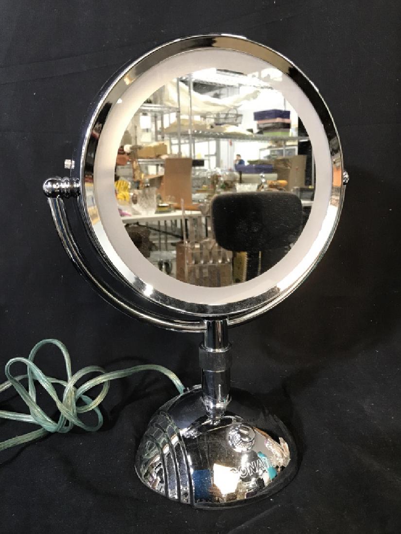 Conair Magnification Vanity Light Up Mirror: Conair Silver Toned Metal Magnification Light Up Vanity Mirror On Stand with two different magnifications, not tested, measures approximately 15 inches tall x 11 inches wide x 6 inches deep. Vanity Mi