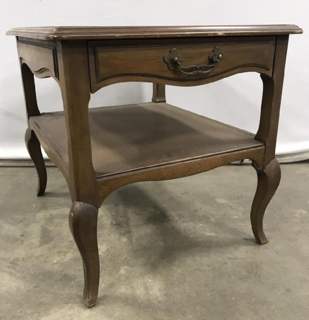 DREXEL Side Table W Drawer: DREXEL side table with single top drawer. Two tier side table. Marked for DREXEL inside drawer. Measures approx 22.5 inches in height by 22 inches in width by 25.75 inches in depth. Brass hardware. So