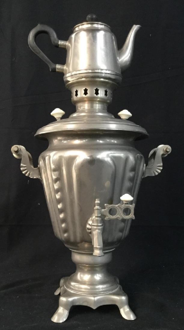 Electrified Vintage Metal Samovar: Electrified vintage Metal Samovar. A Samovar is a heated metal container traditionally used to heat and boil water in Russia, Eastern Europe, the Middle East, and some parts of East Asia. Since the he