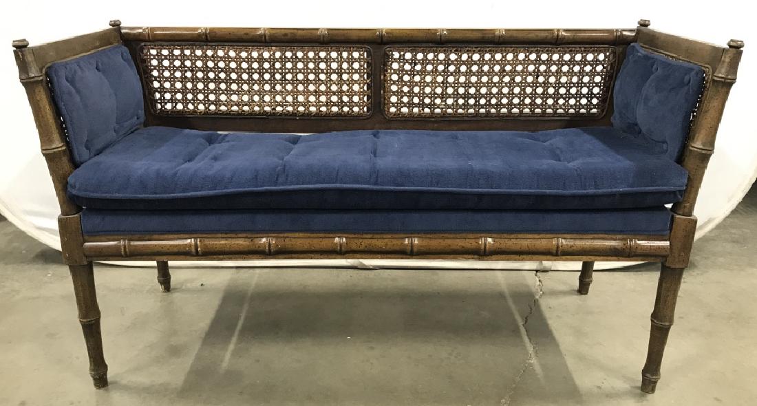 Imitation Bamboo Bench With Caned Back Sides: Vintage Imitation Bamboo Bench With Caned Back And Sides And Upholstered Blue Cushions, some surface wear, measures approximately 47 inches long x 17 inches deep x 27 inches tall. Vintage Bench, Bambo