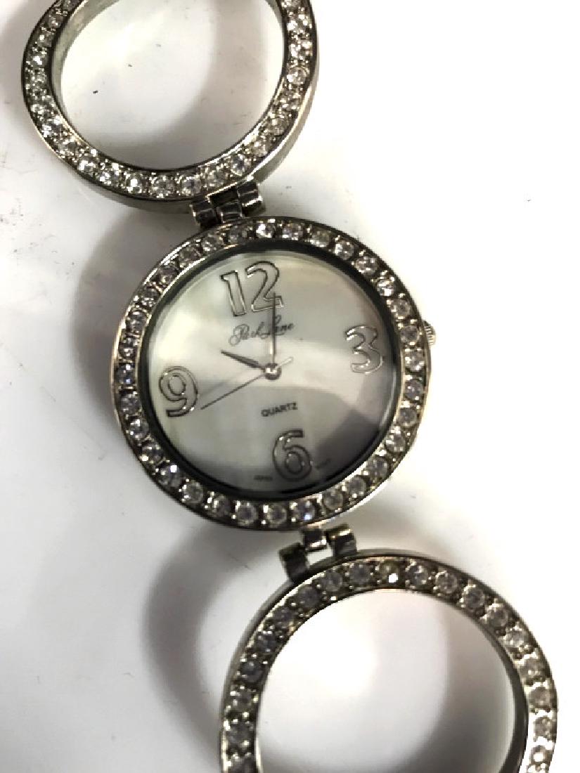 Park Lane Quartz Ladies Watch: Park Lane Quartz Ladies Watch, formed of silver toned metal spheres face of watch and two flanking spheres with faux diamonds, 7 1/2 in long, face 1 1/2 in diameter, not tested, Park Lane Collectibles