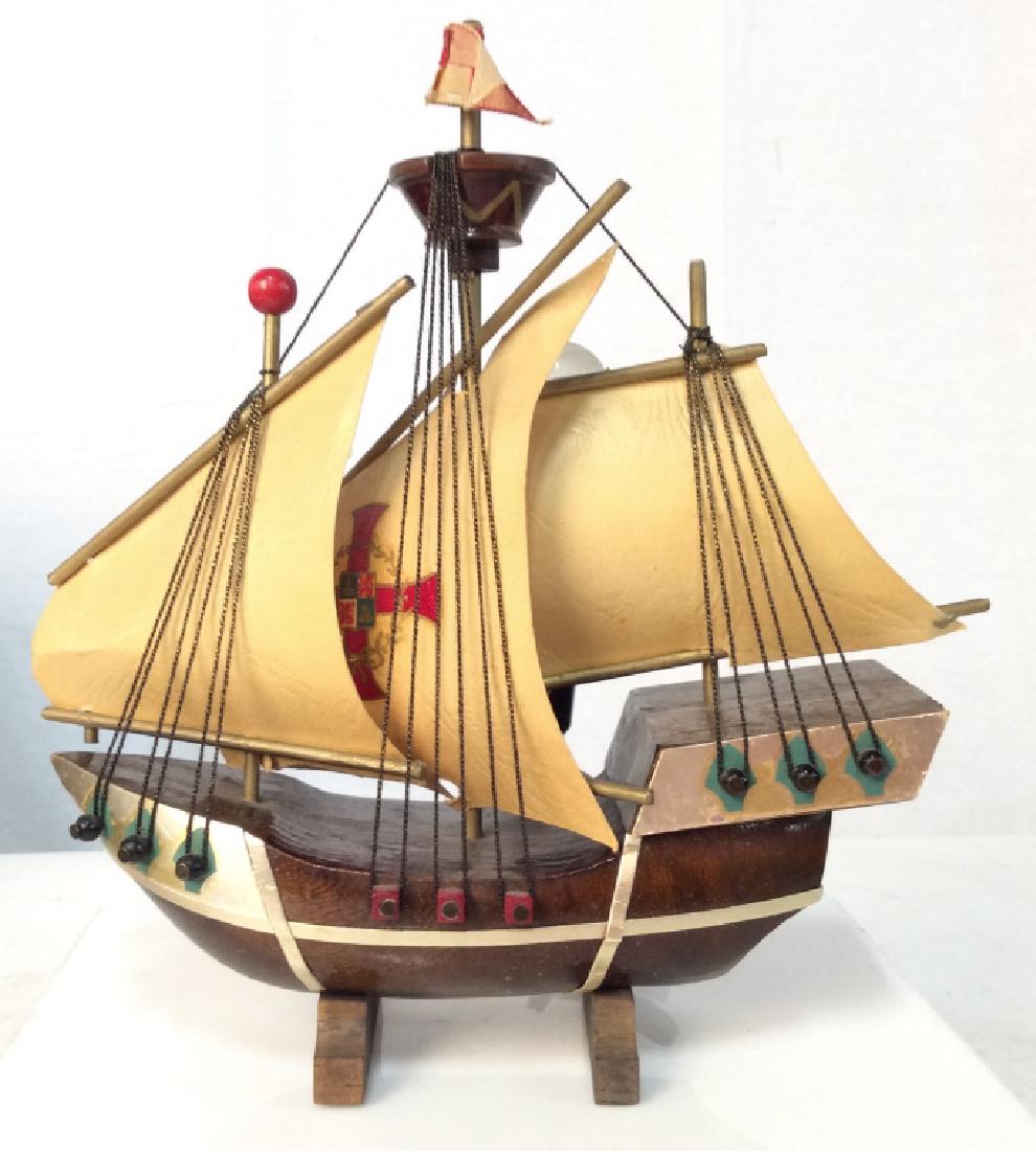 Ships Model Table Lamp, Holland: Made in Holland’s, Painted Wood and paper ships Model, Table Lamp, Bedroom Accessory, Nautical / maritime decor. Lamp not tested. Measures approx 9 in by 8 in by 4 in. 4