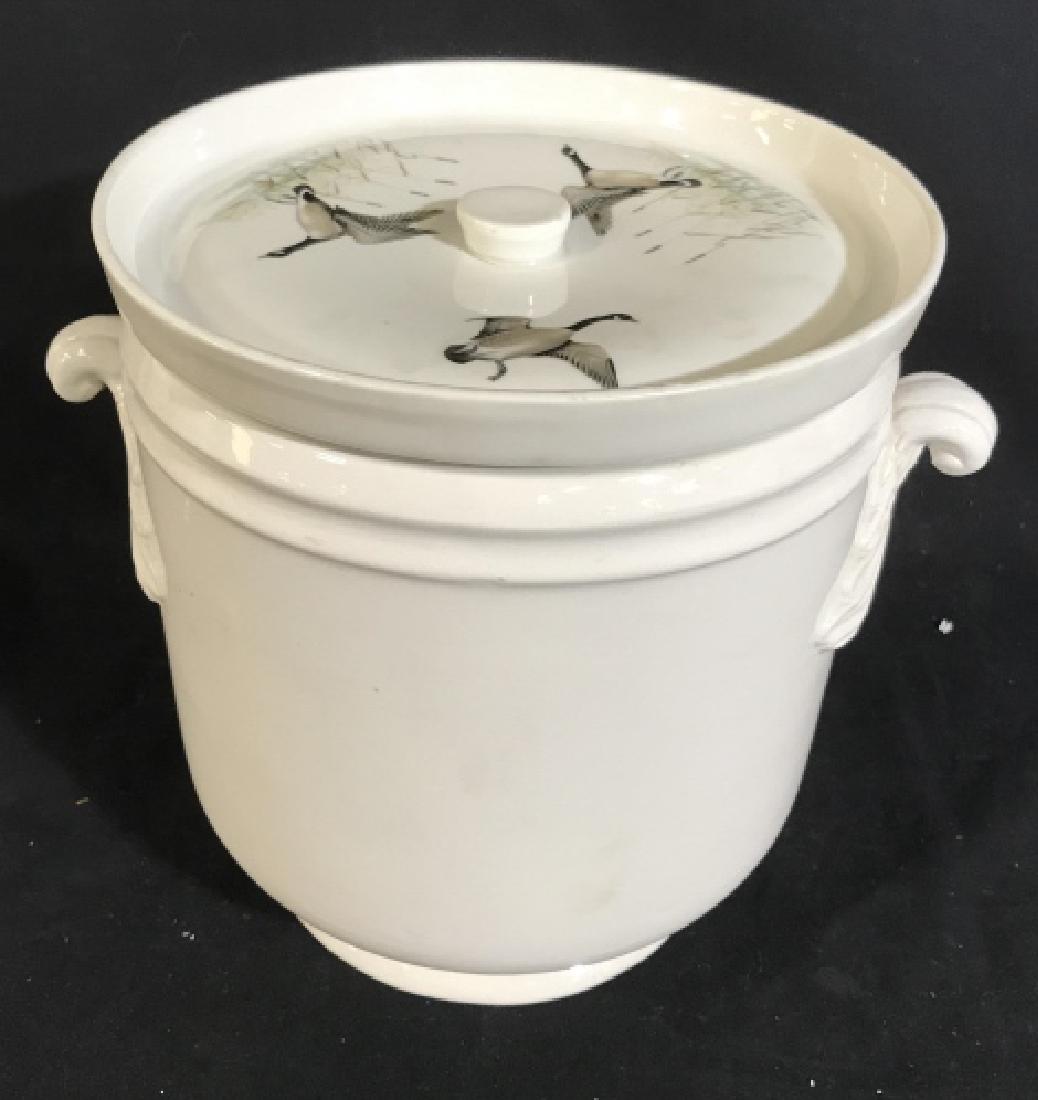 Italian Porcelain Lidded Vessel: Hand painted bird design, geese in flight, possibly ice bucket, champagne bucket, vase, cache pot, measures app ht 9 inches diameter to each scrolled handle app 11 inches