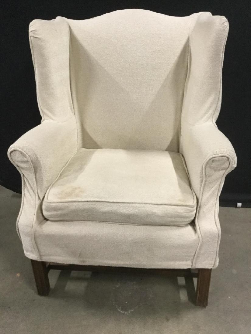 Vintage Wingback Armchair W Slip Cover: Fabric slip cover is cream in tone. Chair under cover is vibrant saffron yellow in tone. Measures approx 41 inches in height by 31 inches in width by 28 inches in depth. Some discoloration of slip cov