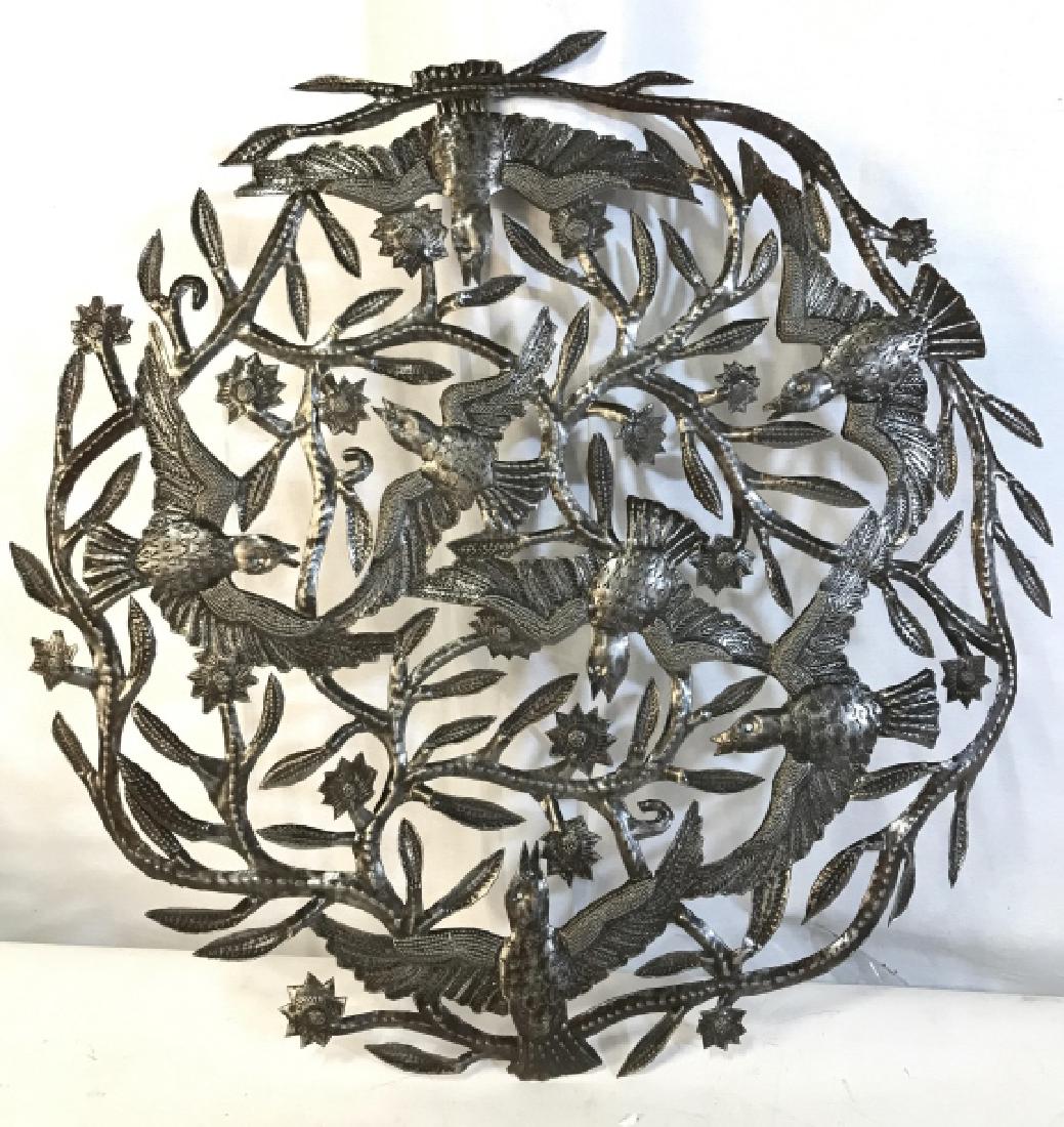 Silver Toned Bird Detailed Metal Wall Hanging Wall: Wall hanging is silver toned and metal. Contains bird, leaf, floral and vine detail. Measures approx 23 inches wide. Wall hanging, home accent home decor 6