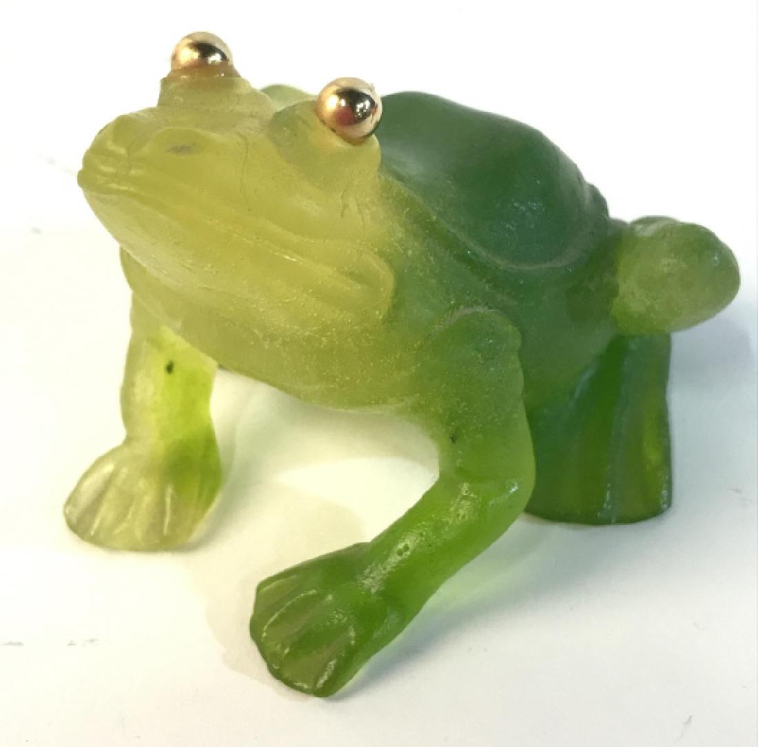 DAUM FRANCE Art Glass Frog: Appears to be cut crystal. Underside is signed DAUM FRANCE. Piece depicts a frog figure. Contains gold toned eyes. Measures approx 3 inches wide & deep, 2.5 inches tall. Home accent, decor piece, anim