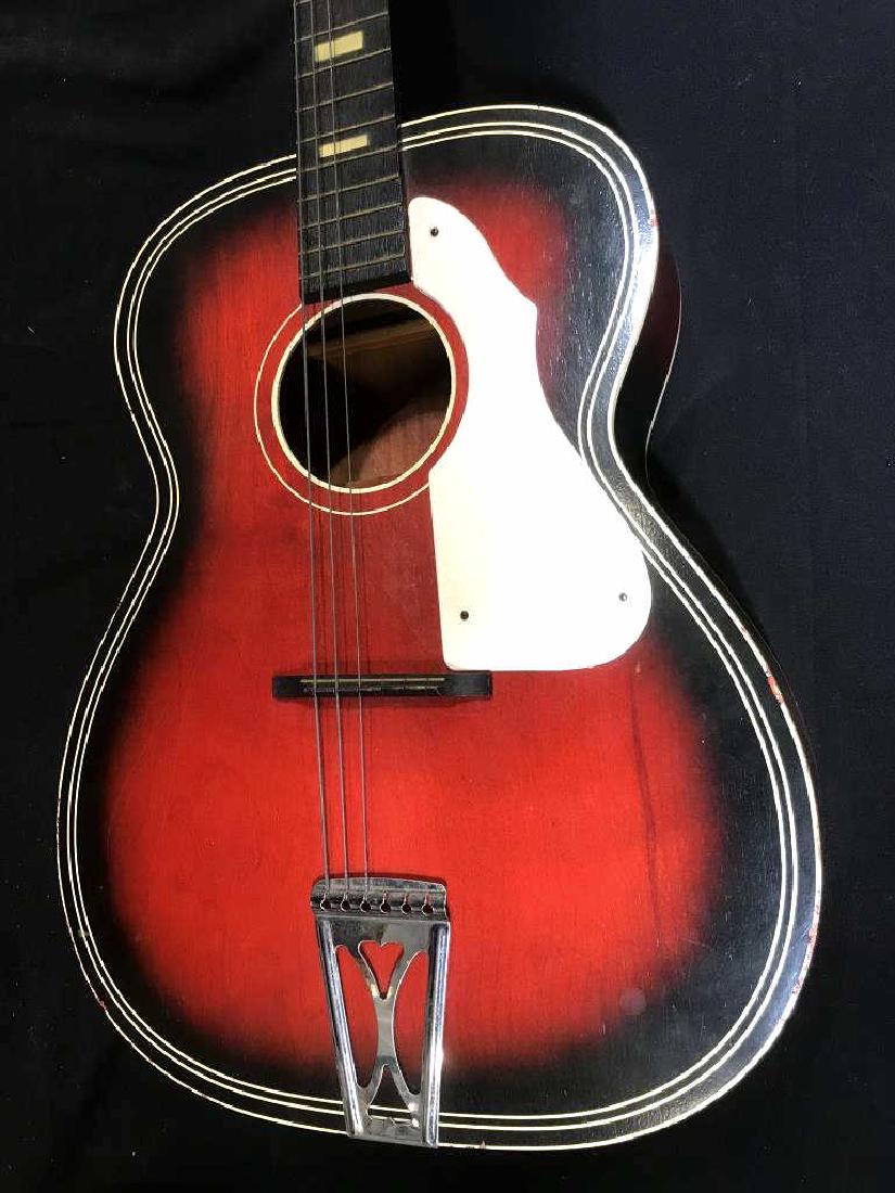 STELLA HARMONY Acoustic Guitar W Gig Bag: Guitar is marked for Stella Harmony, has red and white tone details. Guitar is missing strings, will need restringing. Some minor surface wear of guitar around edges like chipping of paint and surface