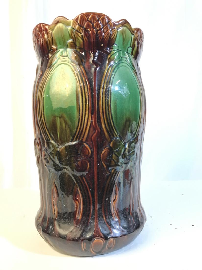 Majolica Glazed Ceramic Umbrella Vessel: Brown and green glazed ceramic pottery majolica, collectible pottery umbrella stand, arts and crafts, planter, decorative accessory, cylindrical vessel, measures ht 19 inches diameter app 11 inches, a