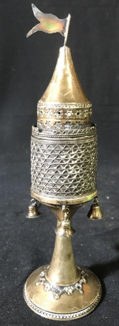 Sterling Silver Religious Vessel: Underside of piece is marked MADE IN ISRAEL SILVER 925. Vessel has lid. Contains 3 Bell shaped structures. Vessel is Pedestaled. Measures approx 8 inches tall 2.5 inches wide. ceremonial iconography, 