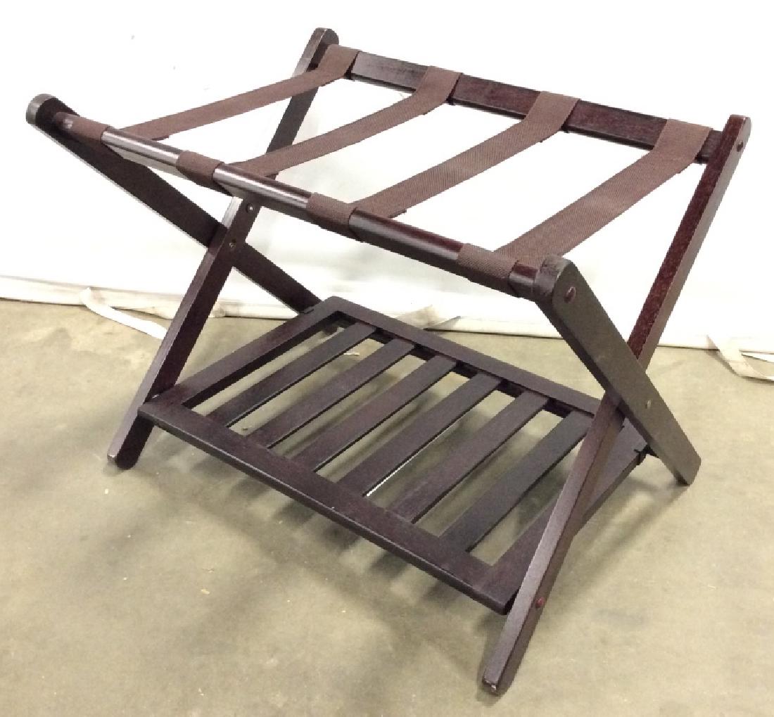 Dark Wooden Folding Luggage Rack: Dark toned wood, foldable design, some minor surface wear, measures app 20 in by 27 in by 19 in. Luggage Rack, guest room accessory, home accessories. 4