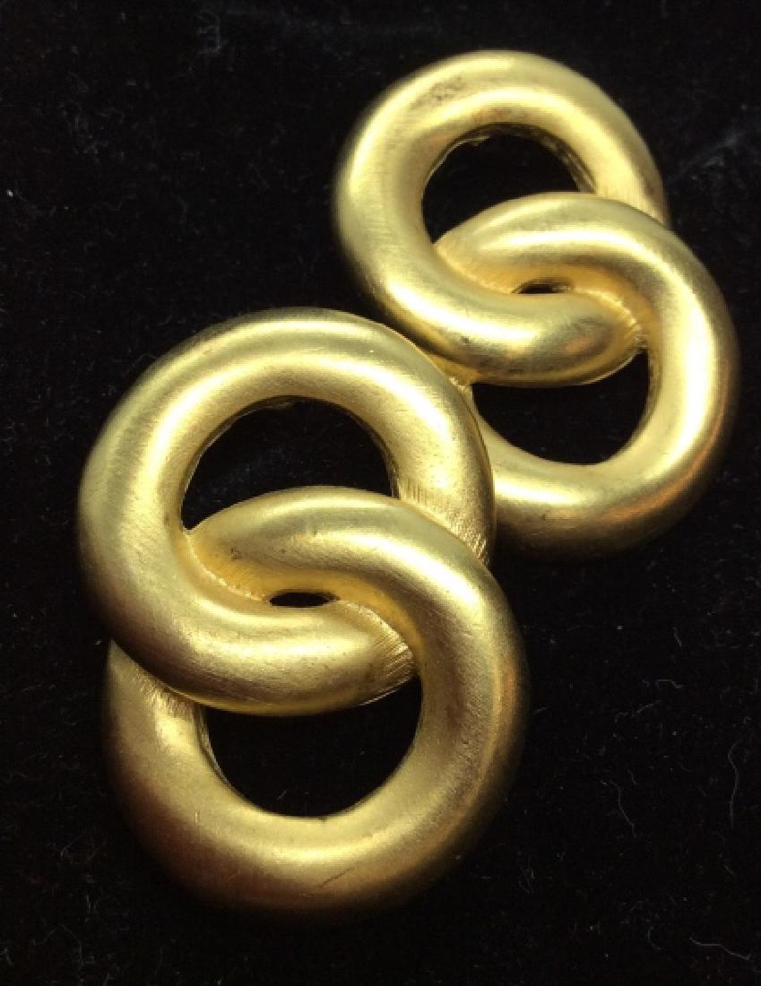 GIVENCHY Gold Toned Metal Earrings: Double circle form earrings, gold toned metal, marked for GIVENCHY on reverse, measures app 1 1/1 in by 1 in. women’s vintage costume estate jewelry, fashion accessories, wearable accessories, state