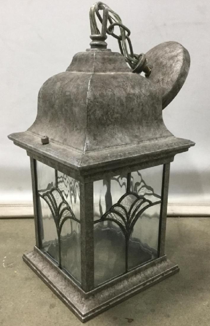 Arts & Crafts Style Hanging Lantern Lamp: Arts & Crafts Style Hanging Lantern Lamp. Silver tone metal frame. Measures approx 14 inches in height by 7.25 inches in length and width. Lamp has not been tested. Interior home decor, interior home 