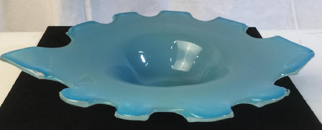 TOZAI HOME Sky Blue Glass Centerpiece Bowl: Sticker label on underside reads for Tozai Home Decor. Bowl is two tone, sky blue and white in tone with shaped rim. Measures approx 2.75 inches in height by 15 inches by 10.5 inches in length and wid