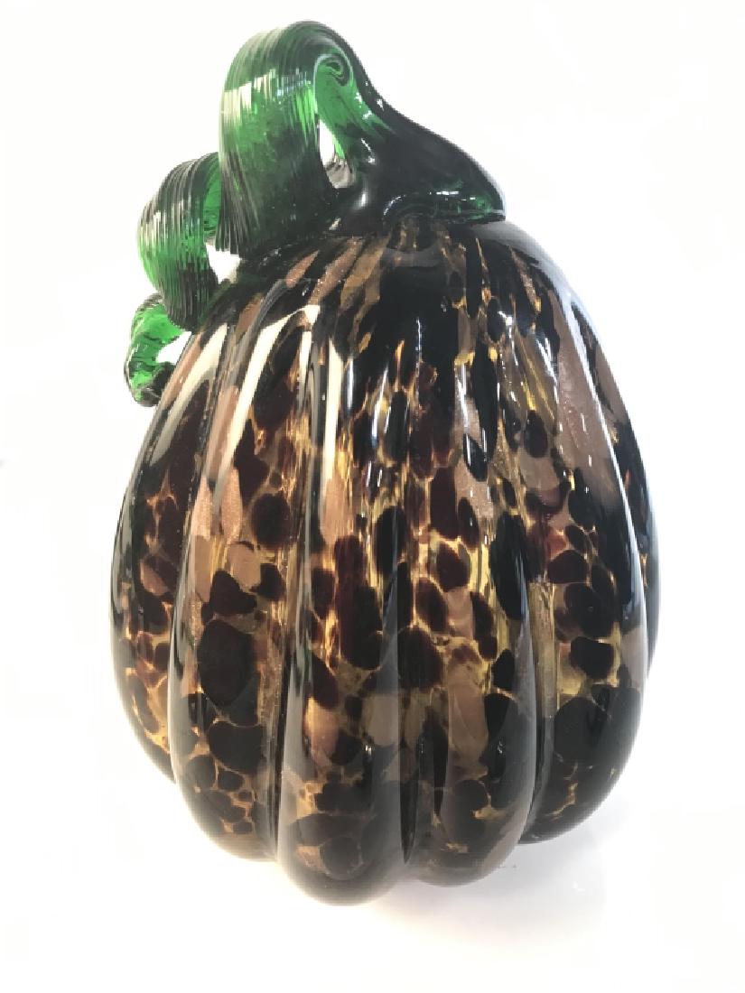 Art Glass Pumpkin Figure: Art Glass pumpkin contains tones of gold, bronze, green, and black. Measures approx 7.5 inches tall 5.5 inches wide. decorative accessory, tabletop accessory, home decor, 6