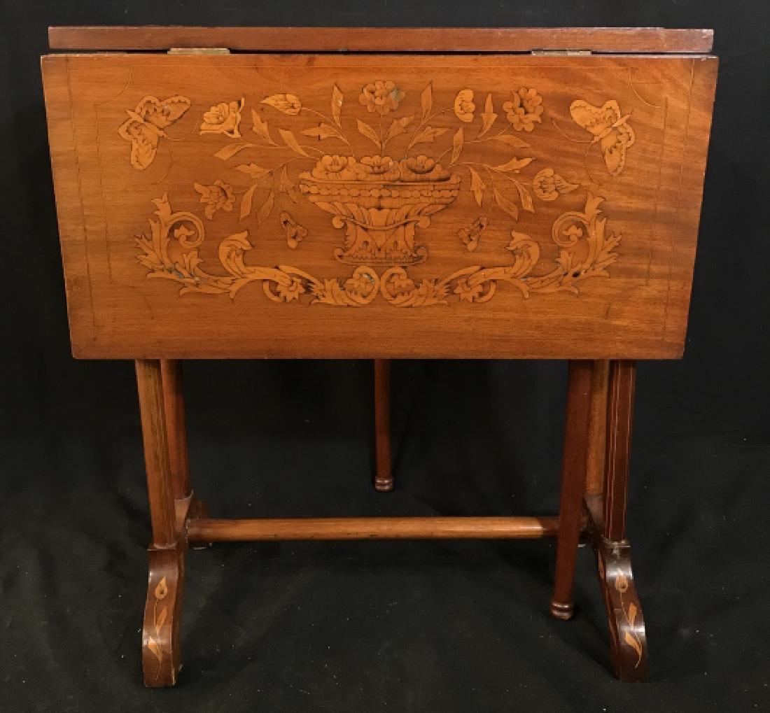 Poss Antique Marquetry Inlaid Drop Leaf Table: Possibly Antique Marquetry Inlaid Drop Leaf Occasional Table With Floral And leaf design, some cracks, chips and scratches due to age and use, measures approximately 23.5 inches tall x 21.5 inches wid