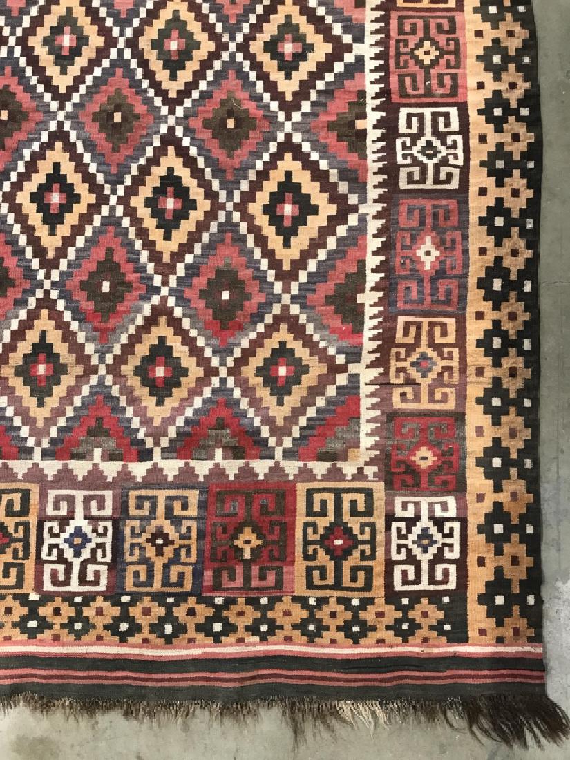 Hand Knotted Flat Weave Wool Kilim Carpet: Hand Knotted Flat Weave Wool Kilim Carpet In the style of Haji M Nasim Studio, Maimana Afghanistan, Woven In Red, Blue, cream, grey, and brown geometric shapes, some minor wear to end fringe and small