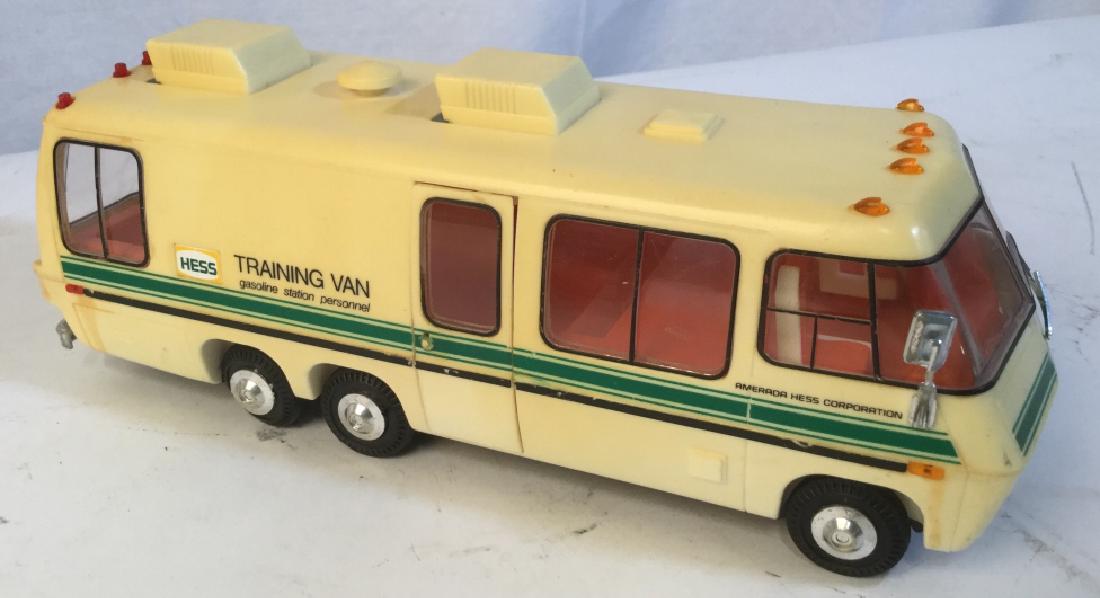 Vintage Hess Van: Toy, 1978 Amerada Hess Corporation Training Van. outside Yellowed by Sun. Inside Orange. No Cracks in Plastic. Has All Wheels. Approx 11 in. Length. In Good Condition. Not been tested with batteries.