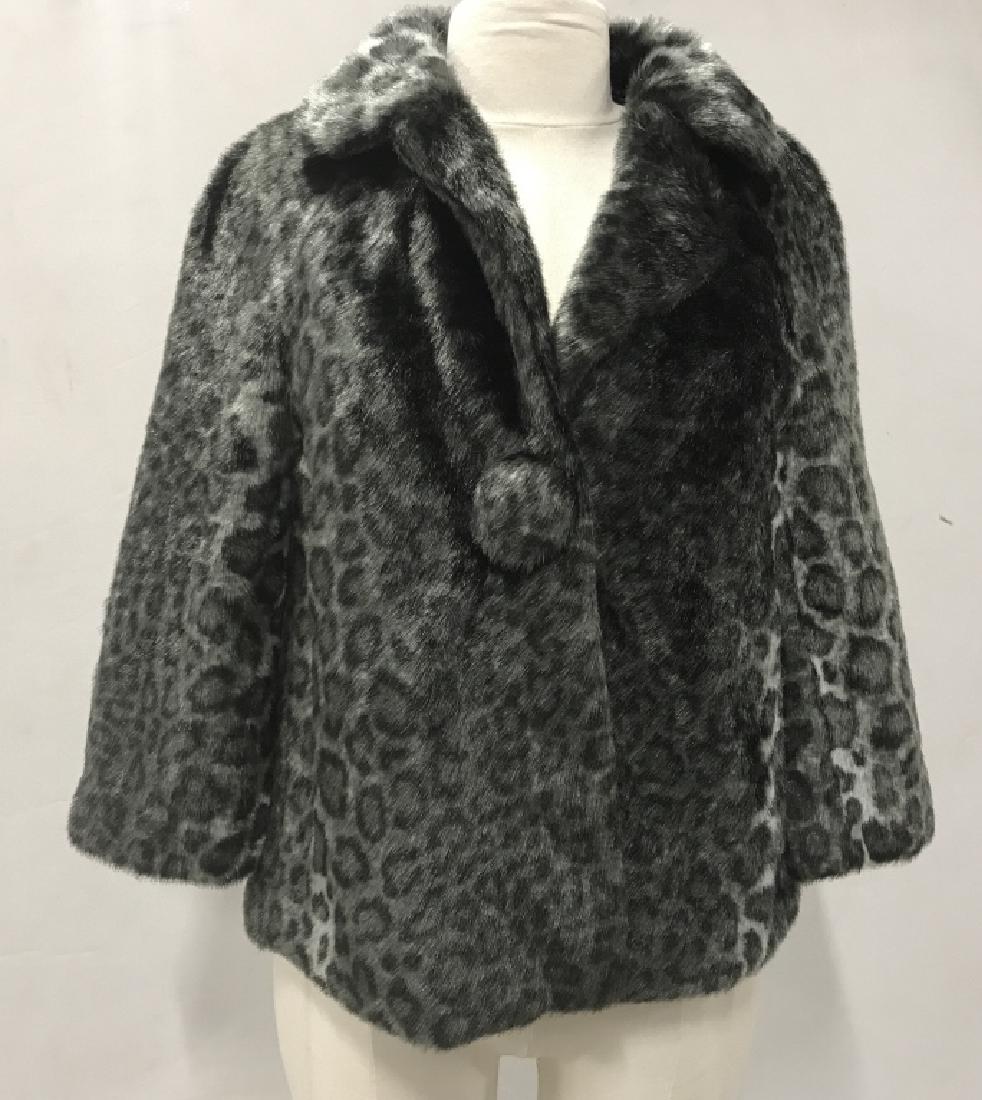 KATE SPADE Designer Leopard Print Fur Style Jacket: Label reads for Kate Spade, size Small. Lot has original tag. Blue grey in tone, Snow leopard print. Single snap button closure. Bow detail on back. Women’s ladies’ fashion accessory, outerware, K