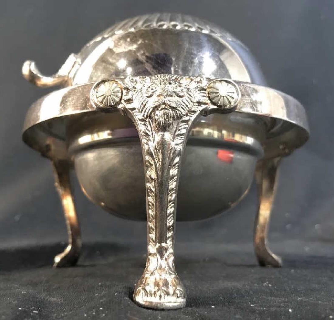 Silver Toned Footed Metal Dome Vessel: Sugar dish, cany dish, tableware, tabletop accessory, condiment dish, Piece is silver toned and metal. Contains 3 ornately detailed feet. Marking on underside is illegible. Candy dish, silver vessel, 