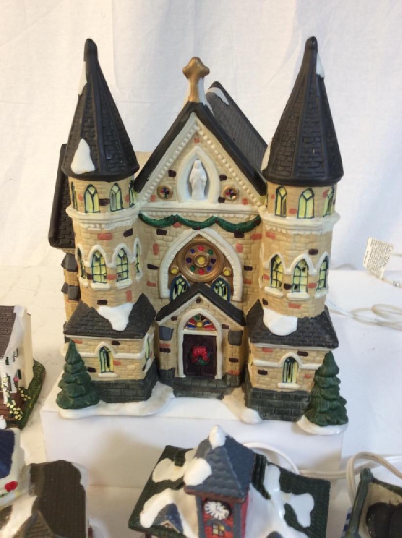 Vintage Christmas Village Holiday Decoration Set: Porcelain set of 6. Lrg Church, Mini Fire And Train Station, Bank, Tudor Home + one Gone With The Wind ‘Tara’ Home . No Surface Condition Issues Noted, May Need Change Of Bulb, lights not tested.