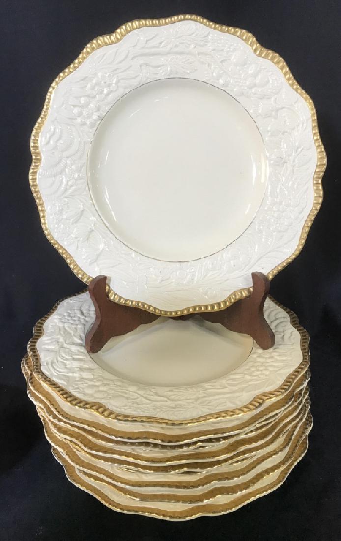 Set Porcelain Gold White Dinner Plates, England: Partial service includes 12 dinner Plates each Measures app 11 inches diameter, and 10 Salad Plates or Bread Plates, some rim chips, embossed banding Of Gold and raised grape and vine pattern, Back re