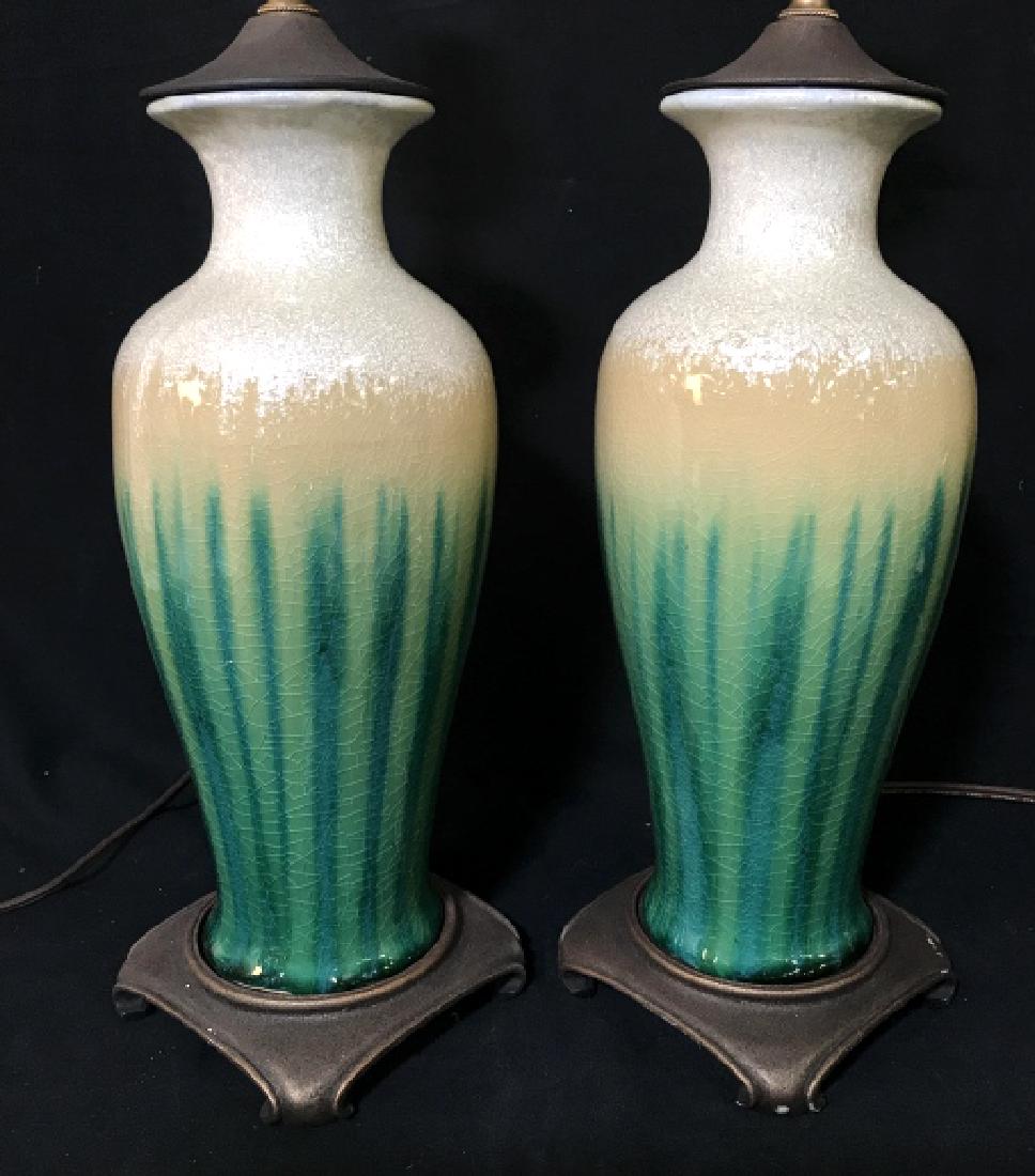 Pair Of Glazed Ceramics Table Lamps With Finials: Pair Of Glazed Ceramics Table Lamps On Bronze Toned base, Finials included and silk lined shades, measures approximately 26 inches tall x 14 inches in diameter, lamps not tested. Table Lighting, Bedsi