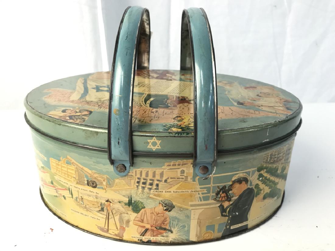Metal Judaica Handled Keepsake Box: Metal box contains 2 handles. Contains various images of multiple figures, The Star Of David, And Hebrew Characters. Measures approx 11 inches long 8.5 inches deep, 7 inches tall with handles. hebraic