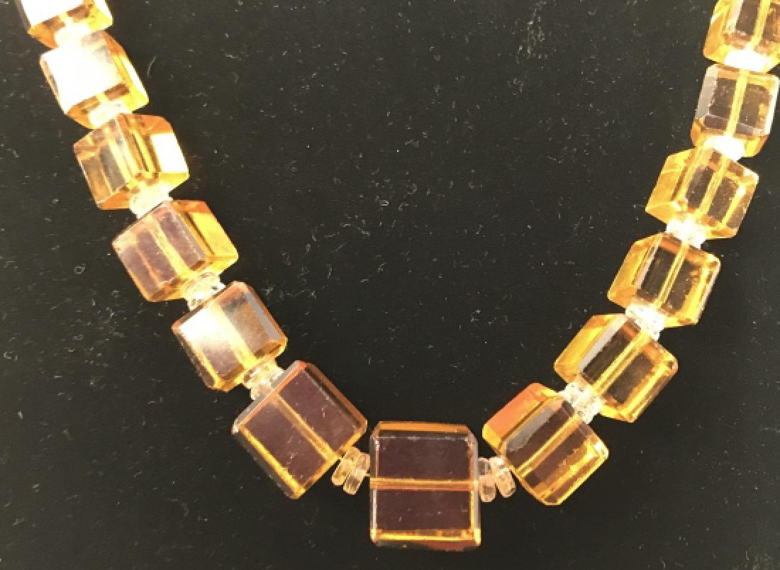 Poss Bakelite Amber Cube Necklace: Piece appears to possibly be Bakelite. Contains an Amber tone. Beads have cubed shape. Measures approx 30 inches. women's fashion accessory, vintage estate jewelry, wearables, 6